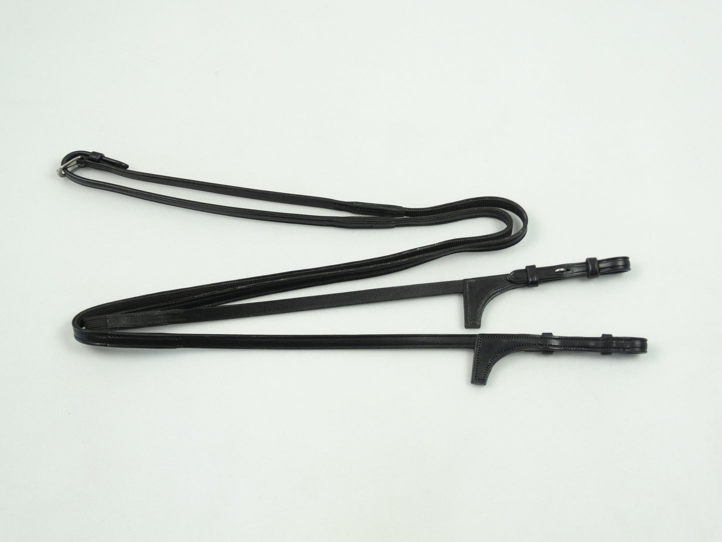 Rênes 1/2 cuir et grip, sans taquet, avec arrêtoirs.